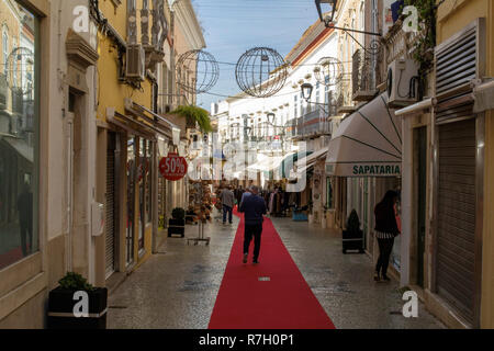loulé,Portugal,01/12/2018. One of the main shopping streets in Loulé with Christmas lighting and a red carpet to walk on. Stock Photo