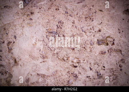 pink marble texture interspersed with quartz. vignette, background, geological. Stock Photo