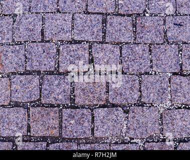 gray cobblestone tiled sidewalk pavement. background, texture. Stock Photo