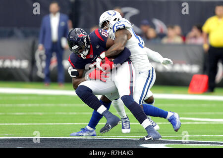 Houston, Texas, USA. 9th Dec, 2018. Houston Texans tight end Jordan Thomas (83) is tackled by Indianapolis Colts outside linebacker Darius Leonard (53) after a pass reception during the third quarter of the NFL regular season game between the Houston Texans and the Indianapolis Colts at NRG Stadium in Houston, TX on December 9, 2018. Credit: Erik Williams/ZUMA Wire/Alamy Live News Stock Photo