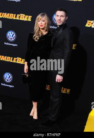 Hollywood, USA. 09th Dec, 2018. HOLLYWOOD, CA - DECEMBER 9: Director Travis Knight and wife Penny Knight attend Paramount Pictures Presents The Global Premiere of 'BumbleBee' on December 9, 2018 at TCL Chinese Theatre in Hollywood, California. Credit: Barry King/Alamy Live News Stock Photo