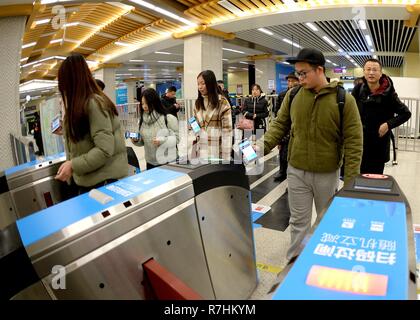 (181210) -- BEIJING, Dec. 10, 2018 (Xinhua) -- Passengers use mobile payment to take subway at the Dayanta Station of Xi'an, capital of northwest China's Shaanxi Province, Jan. 1, 2017. Passengers of Xi'an can take the subway by using the 'Xi'an Subway' app or scanning the QR code of Alipay. China's internet service and related sectors maintained sound growth in the first 10 months of the year, seeing a stable market expansion of online streaming apps, data showed. The sectors' revenue totaled 766.3 billion yuan (about 111.6 billion U.S. dollars) in the Jan.-Oct. period, up 18 percent year Stock Photo