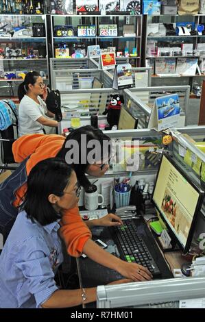 (181210) -- BEIJING, Dec. 10, 2018 (Xinhua) -- Staff members design an e-commerce website homepage at an innovation company in Yiwu, east China's Zhejiang Province, on Sept. 12, 2018. China's internet service and related sectors maintained sound growth in the first 10 months of the year, seeing a stable market expansion of online streaming apps, data showed. The sectors' revenue totaled 766.3 billion yuan (about 111.6 billion U.S. dollars) in the Jan.-Oct. period, up 18 percent year on year, according to the Ministry of Industry and Information Technology (MIIT). From January to October, Stock Photo