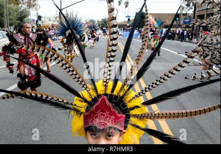 Los Angeles, USA. 9th Dec, 2018. Participants march along the parade route during the annual Boyle Heights Christmas Parade in Los Angeles, the United States, on Dec. 9, 2018. Credit: Zhao Hanrong/Xinhua/Alamy Live News Stock Photo