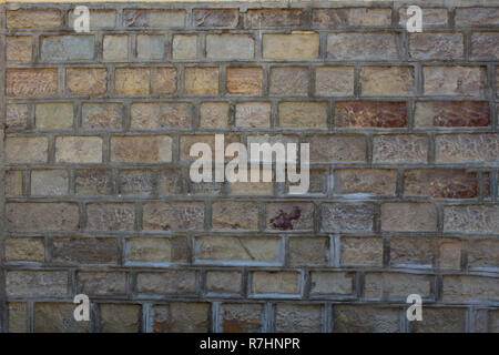 Wall urban beige blocks. Stock Photo