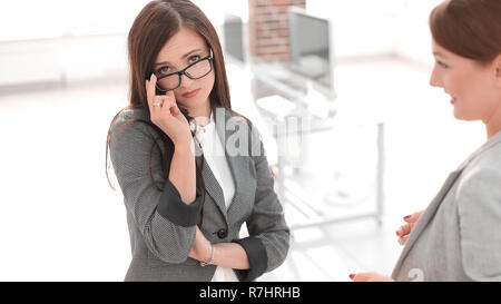 two employees on a blurred office background Stock Photo