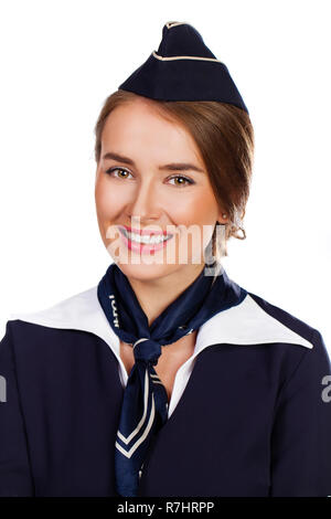 Close up, beautiful dark haired young business woman dressed in a dark blue suit with a blue scarf smiling, isolated on white background Stock Photo