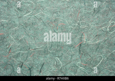 background of green textured handmade mulberry paper Stock Photo