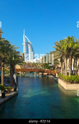 DUBAI, UAE - NOV 12, 2018: View of Burj Al Arab hotel from Madinat Jumeirah hotel. Madinat is a luxury resort which includes hotels and souk covering  Stock Photo