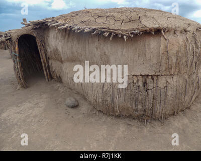 Africa, Tanzania, mud and straw dwelling in a  Maasai tribe village an ethnic group of semi-nomadic people Stock Photo