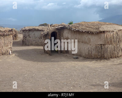 Africa, Tanzania, mud and straw dwelling in a  Maasai tribe village an ethnic group of semi-nomadic people Stock Photo