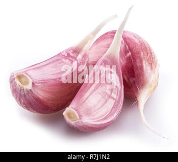 Unpeeled garlic cloves on white background. macro. Stock Photo