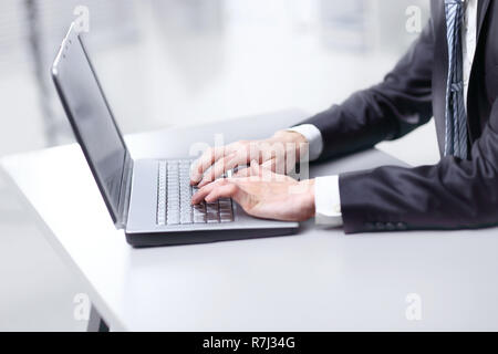 close up. businessman typing on laptop. people and technology Stock Photo