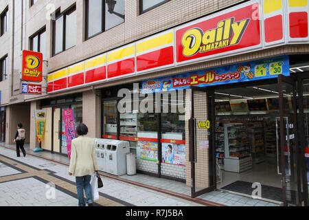 Daily Yamazaki convenience store franchise chain sign Japan