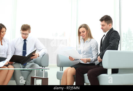 two employees sitting at the Desk in the office.photo with copy space Stock Photo