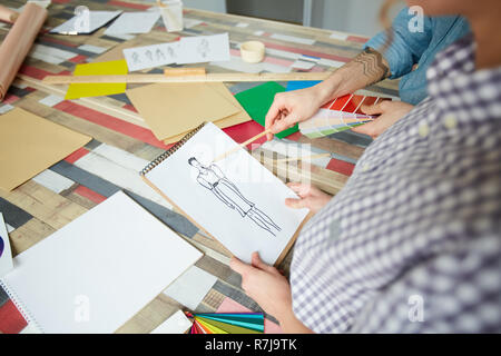 Discussing design of dress Stock Photo