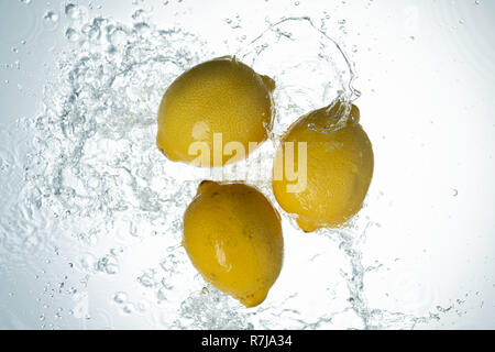 Lemons Water Splash on white background Stock Photo