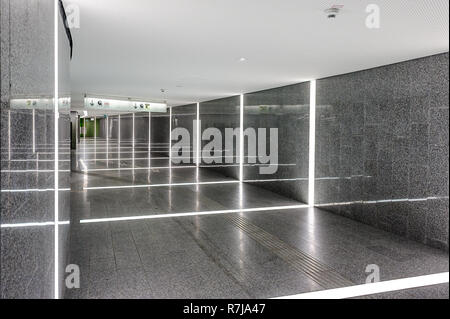 Airport Vienna, Austria ..... corridor towards the train station with impressive LED light Stock Photo