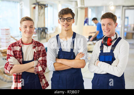 Young carpenter students in workshop Stock Photo