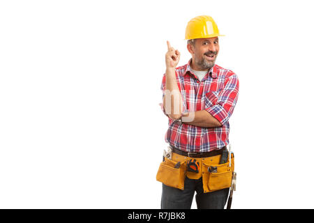 Happy constructor with index finger up as having great idea gesture isolated on white studio background Stock Photo
