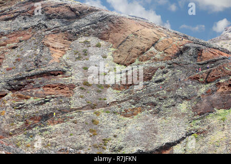Mountain hiker at a Rock formation on the peninsula Ponta de São Lourenço on the island Madeira Stock Photo