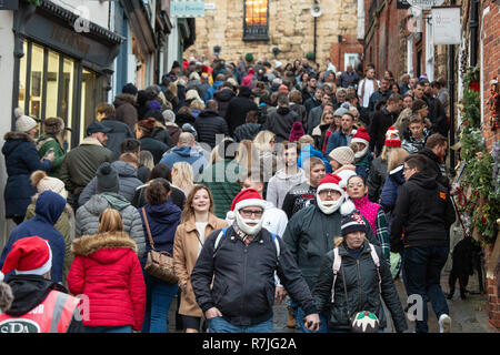 A busy stretch of Steep Hill in the first week of December in Lincoln, England, UK. The steep takes shoppers from the High Street to the Cathedral. Stock Photo