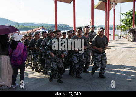 Soldiers running in Laos Thai Stock Photo