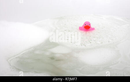 Pink duck in a bathtub Stock Photo - Alamy