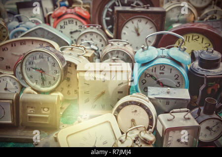 Vintage alarm clocks background Stock Photo