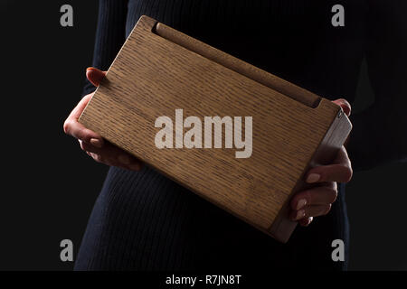 Wooden box in hand Stock Photo