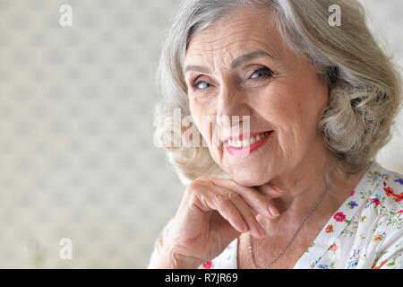 Close up portrait of beautiful senior woman at home Stock Photo