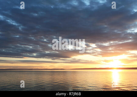 Colorful sunset over ocean Stock Photo