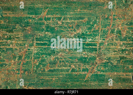 Heavily distressed rusty painted sheet metal poster board Stock Photo