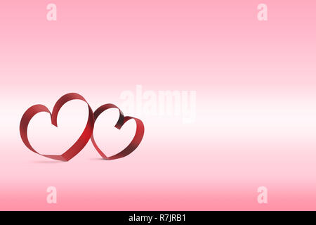 Ribbons shaped as hearts over pink background. Love concept and Valentines day Stock Photo