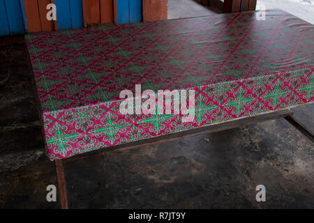 Vinyl tableclothes, recycling old advertising signs in Pekanbaru, Indonesia Stock Photo