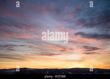 Beautiful sunset, clouds in many colors Stock Photo
