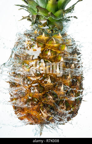 Pineapple Water Splash on White Baclground Stock Photo