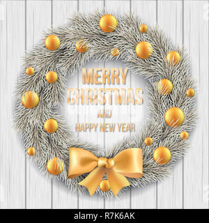White Christmas wreath with golden balls and ribbon on a vintage wooden background. Element for the design of a Christmas card, invitation or banner. Stock Photo