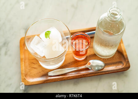 Lime ice Cube juice serve with soda water mojito Stock Photo