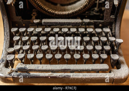 old vintage dust-covered typewriter Stock Photo