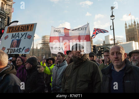 Pro Brexit Rally, London UK, organised by UKIP with far right supporters. Placard with 'Treason May Judas' and English flag with 'Hard Brexit Traitor' Stock Photo