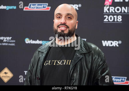 Bochum, Deutschland. 07th Dec, 2018. ABDELKARIM, comedian, half-length portrait, on the red carpet of the EinsLive Krone ceremony on 06.12.2018 in Bochum/Germany Â | usage worldwide Credit: dpa/Alamy Live News Stock Photo