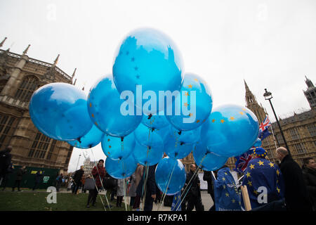 London UK. 10th December 2018. Pro Europe protesters release balloons painted with European European flags  outside Parliament to demand a people's vote and a second referendum on the day Prime Minister Theresa May's postpones the Brexit Agreement  vote in the House of Commons Credit as markets react to the news and the British Pounds falls to its lowest against the US DollarCredit: amer ghazzal/Alamy Live News Stock Photo