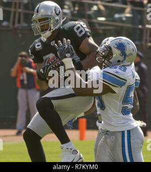 Detroit Lions linebacker Alex Lewis (59), center, celebrates