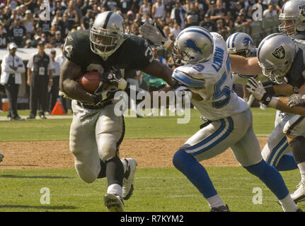 Detroit Lions linebacker Alex Lewis (59), center, celebrates