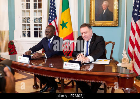 Washington, DC, USA. 10th Dec, 2018. US Secretary of State Mike Pompeo and Senegalese Prime Minister Mahammed Boun Abdallah Dionne at the Millennium Challenge Cooperation Signing Ceremony in the Treaty Room at the Department of State in Washington, DC. Credit: Michael Brochstein/SOPA Images/ZUMA Wire/Alamy Live News Stock Photo