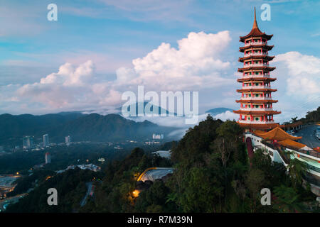 View of the Pagoda in the morning with low level cloud and hills in the background Stock Photo