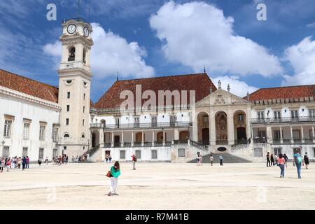 COIMBRA, PORTUGAL - MAY 26, 2018: Tourists visit Coimbra University in Portugal. The university is a UNESCO World Heritage Site. Stock Photo