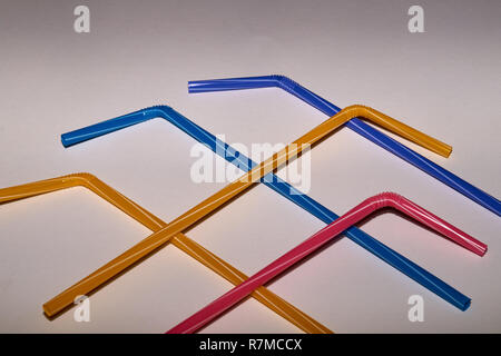 Stop using Plastic drinking straws, straws in different colors Stock Photo