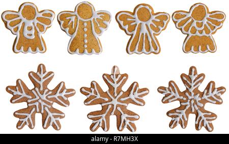 Set of gingerbread cookies in the shape of snowflakes and angel with honey and cinnamon isolated on white background Stock Photo